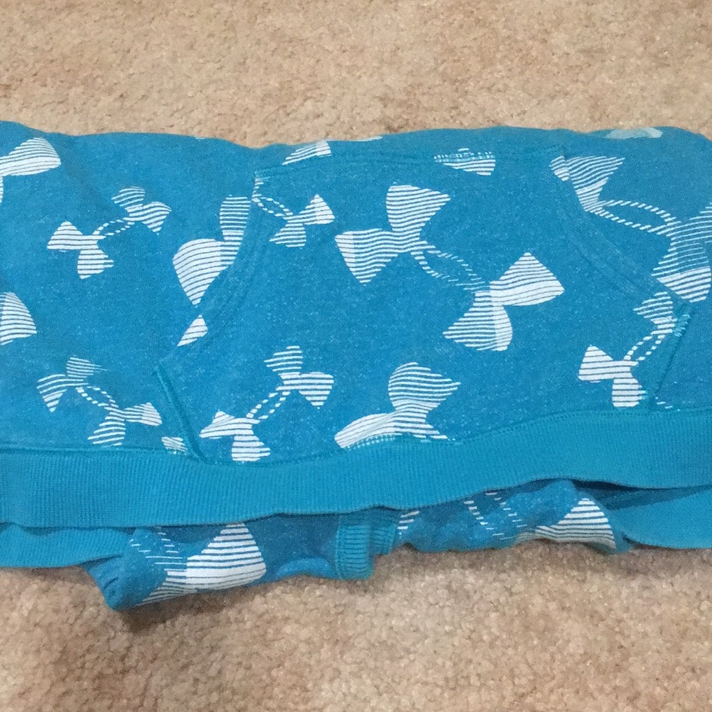 A blue and white Under Armor sweatshirt